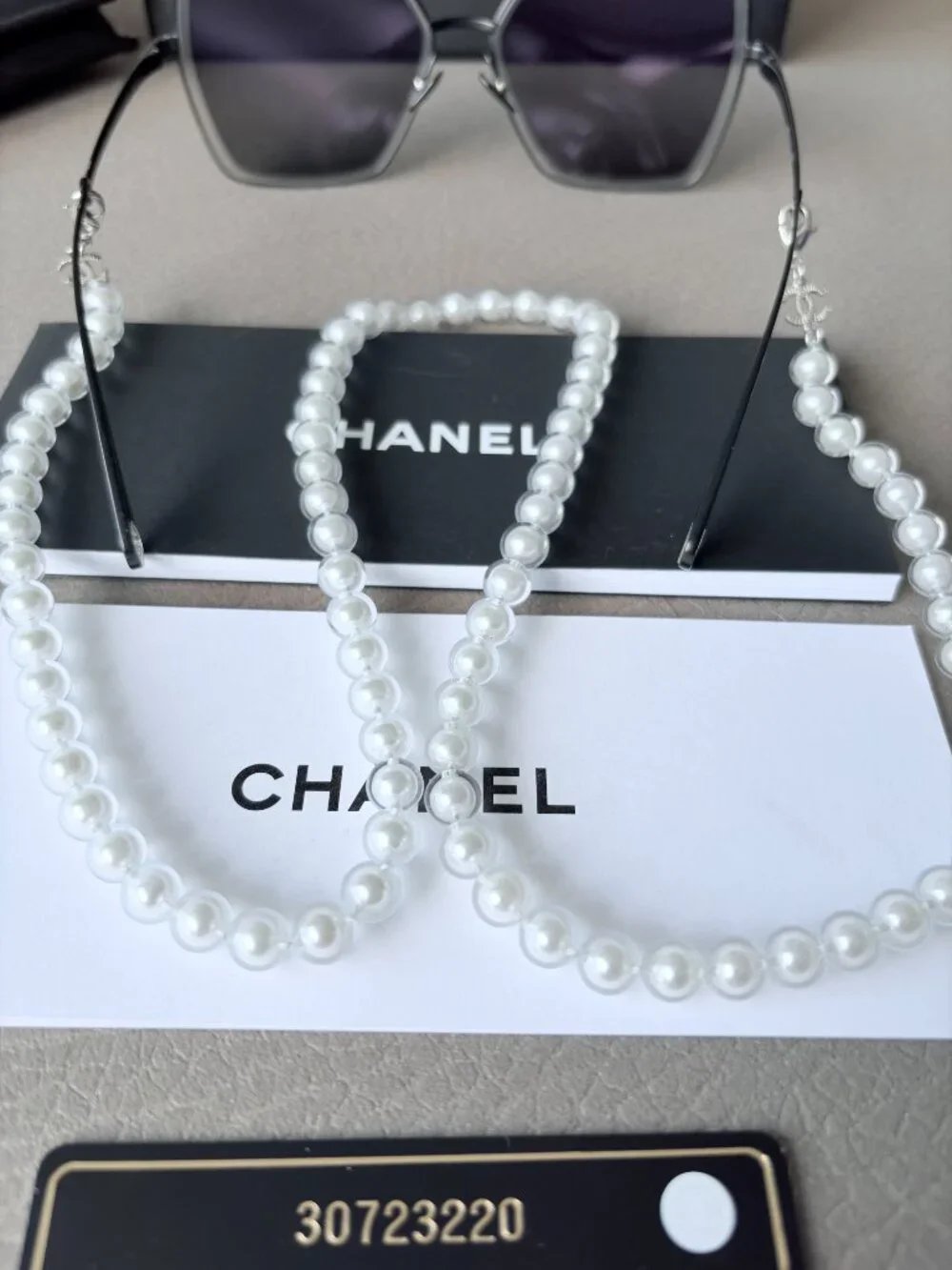 Chanel Butterfly Sunglasses featuring a removable pearl chain